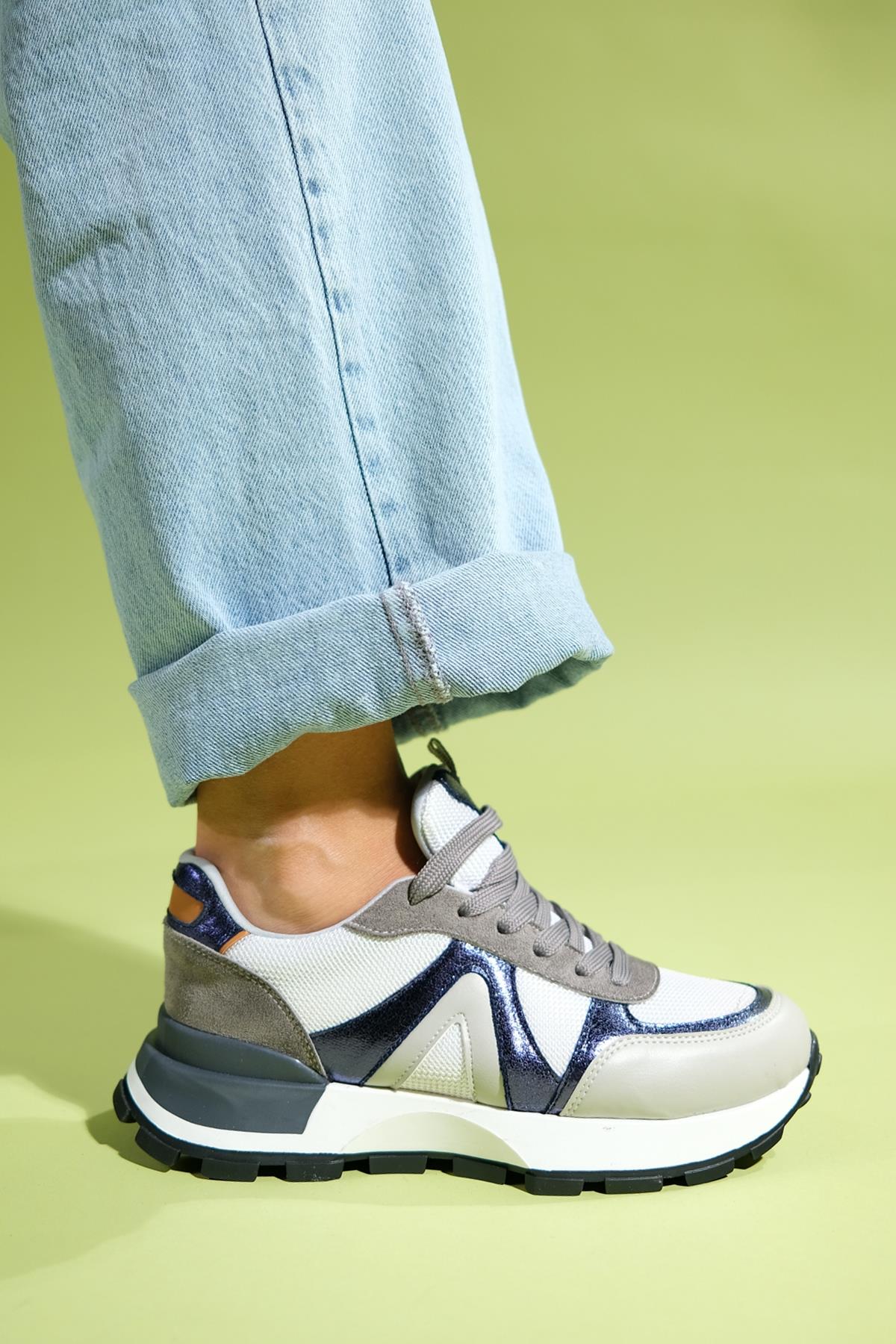 Calm - Gray Multi Sneaker – detail view showing leather, Vowalisse