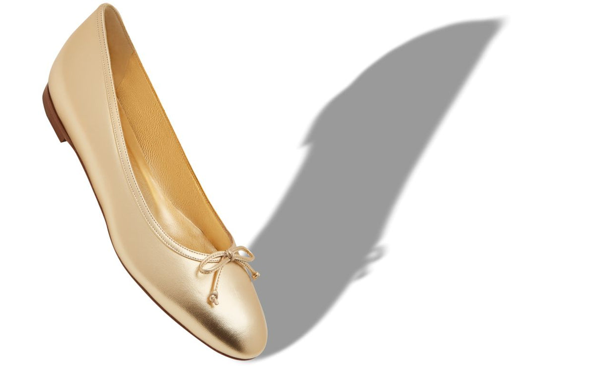 Odette Flame Gold Bow Detail Pumps – front three-quarter view showing gold bow detail, round toe, nappa leather, Vowalisse