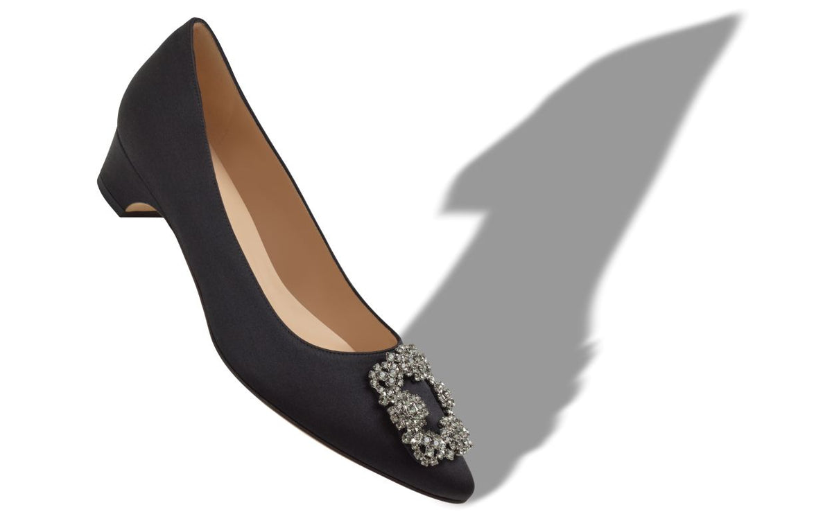 Juliette Shine Black Jewel Buckle Pumps – front three-quarter view showing black jewel buckle, crystal buckle, almond toe…
