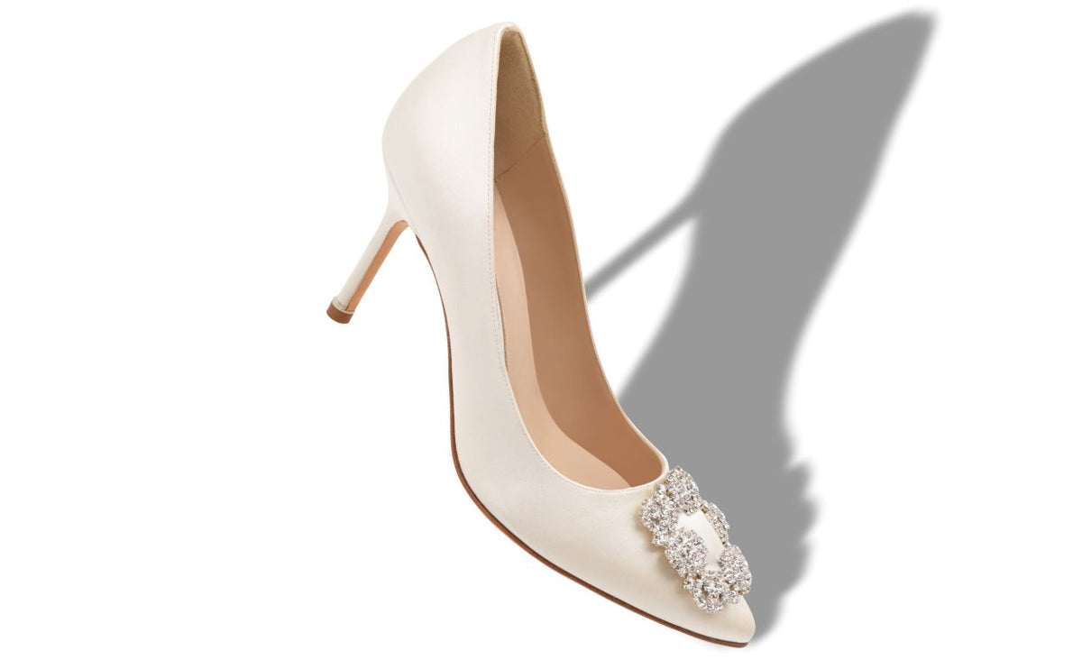 Leonora Shine White Jewel Buckle Pumps – front three-quarter view showing white jewel buckle, crystal buckle, almond toe…