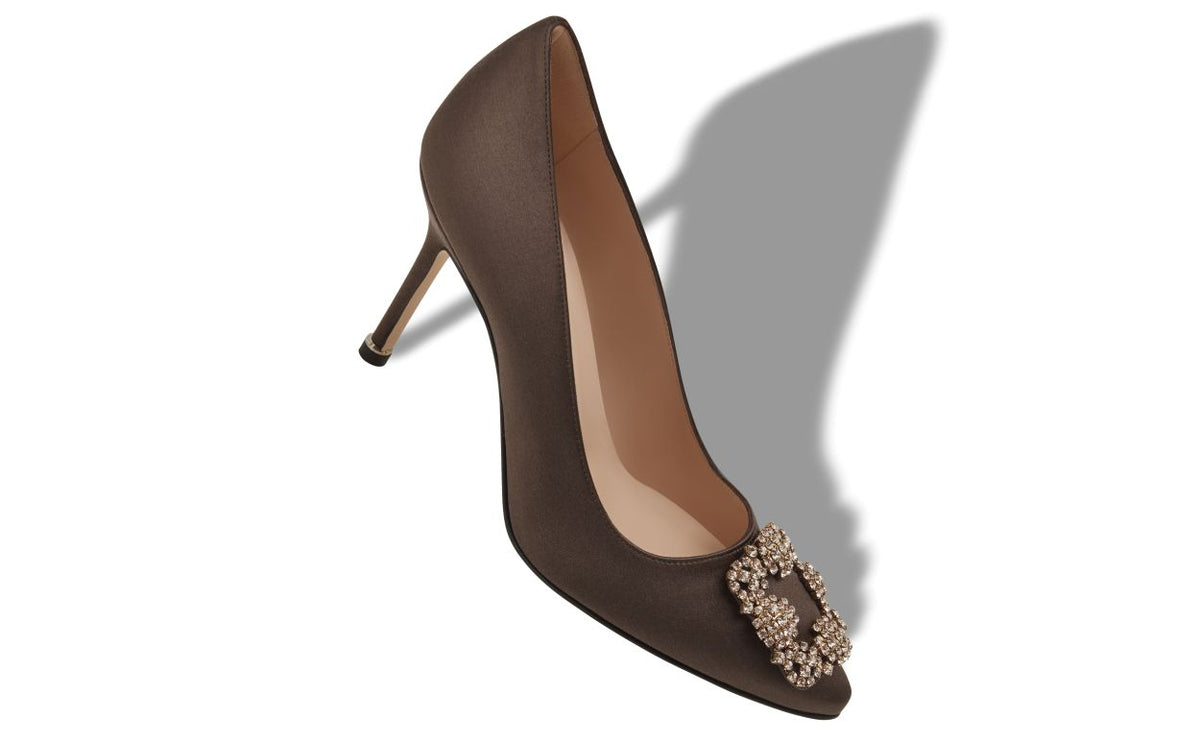 Juliette Élan Brown Jewel Buckle Pumps – front three-quarter view showing brown jewel buckle, crystal buckle, almond toe…
