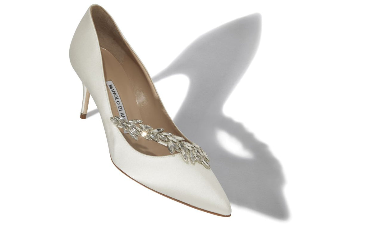 Bianca Belle White Jewel Buckle Pumps – front three-quarter view showing white jewel buckle, pointed toe, satin, Vowalisse