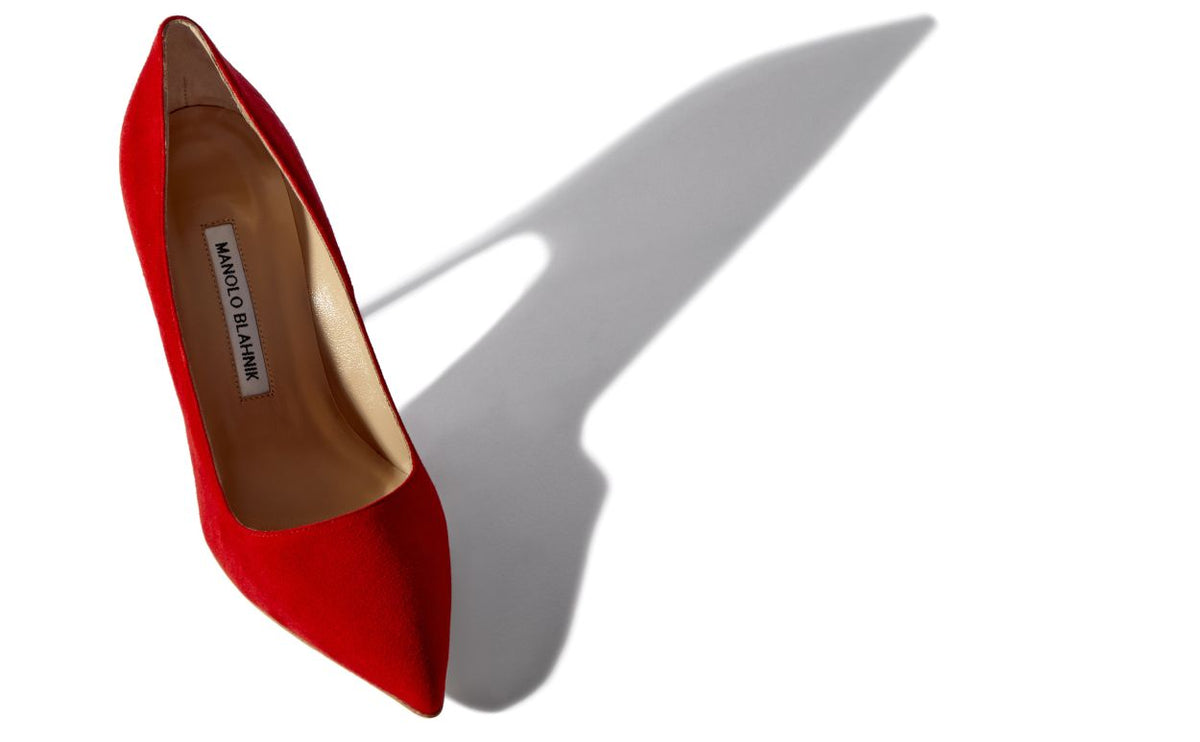 Lunette Bloom Red Pointed Toe Pumps – front three-quarter view showing red pointed toe, suede, Vowalisse