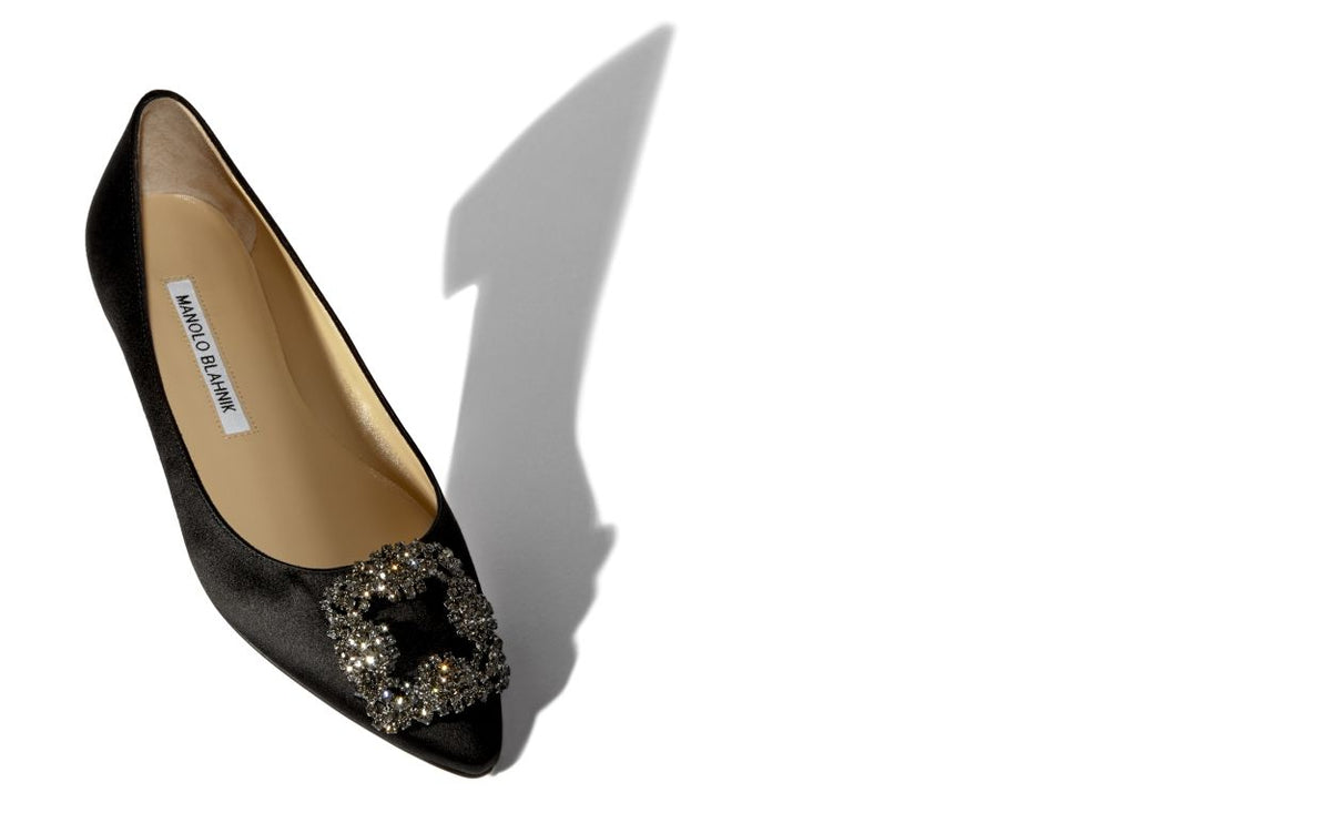 Marcella Belle Black Jewel Buckle Pumps – front three-quarter view showing black jewel buckle, crystal buckle, almond toe…