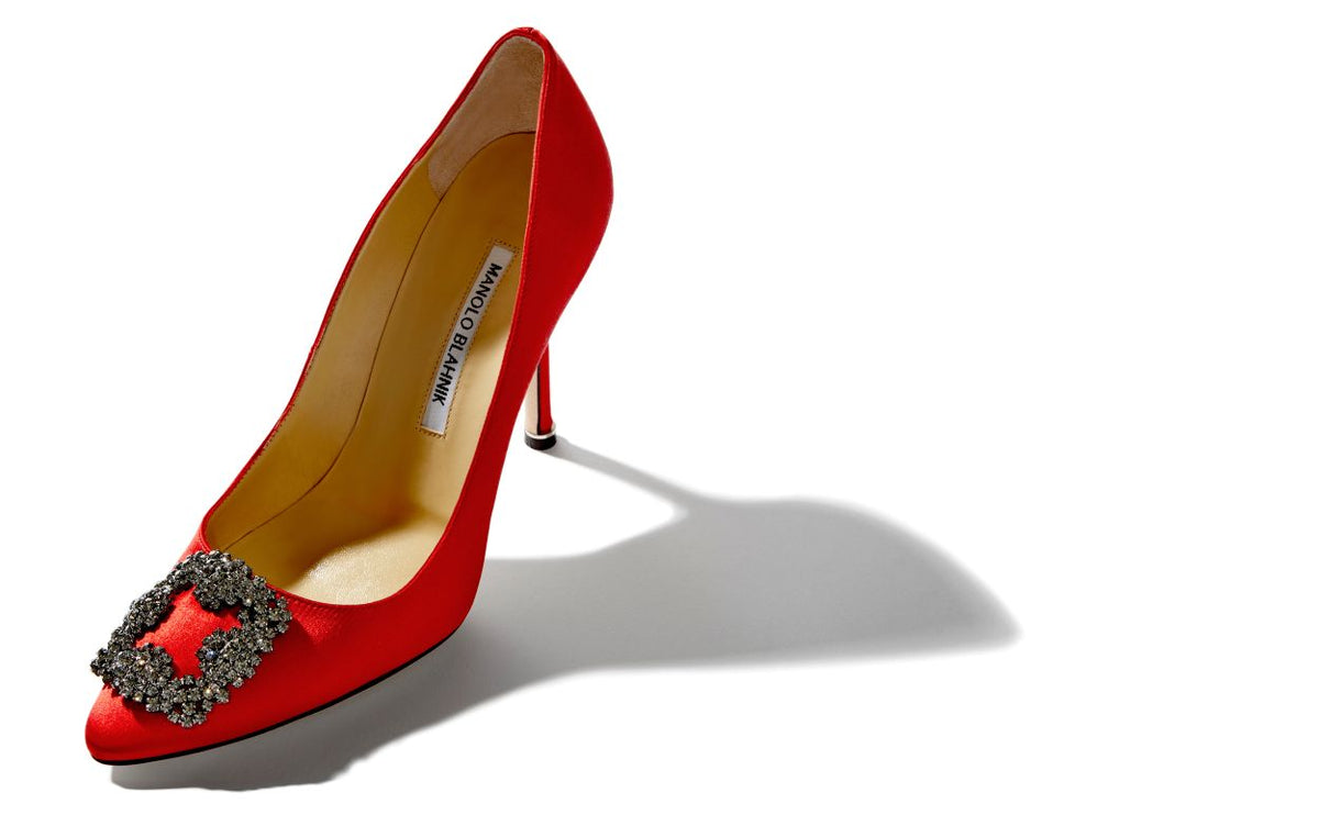 Leonora Belle Red Jewel Buckle Pumps – front three-quarter view showing red jewel buckle, crystal buckle, almond toe, satin…