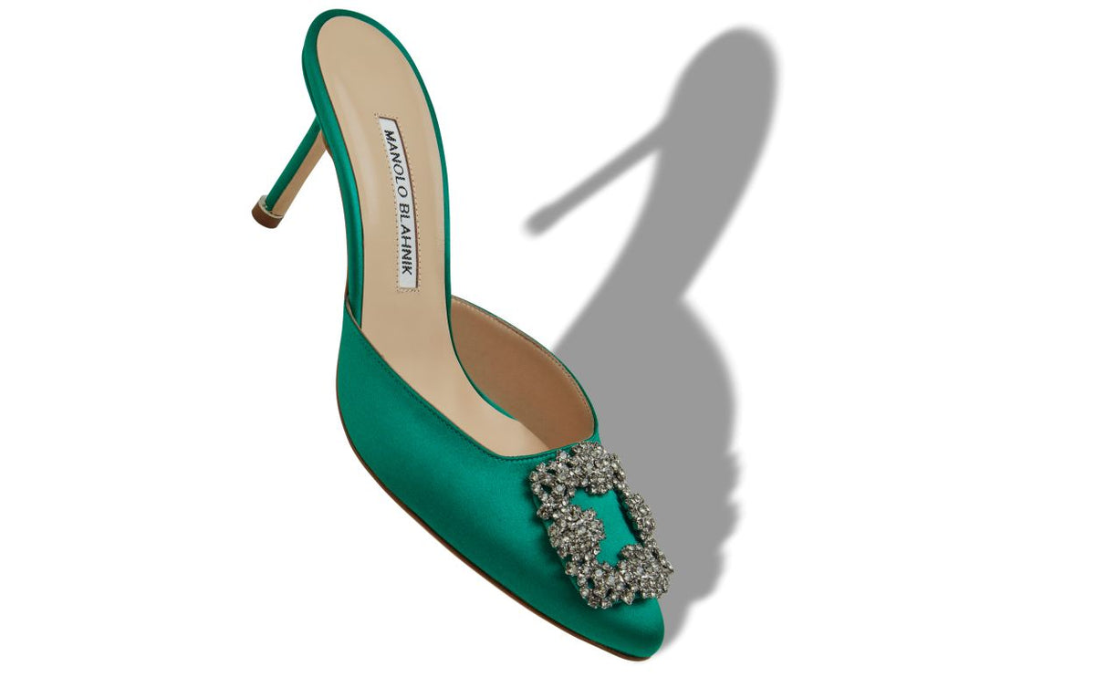 Emmeline Bloom Green Jewel Buckle Mules – front three-quarter view showing green jewel buckle, crystal buckle, almond toe…