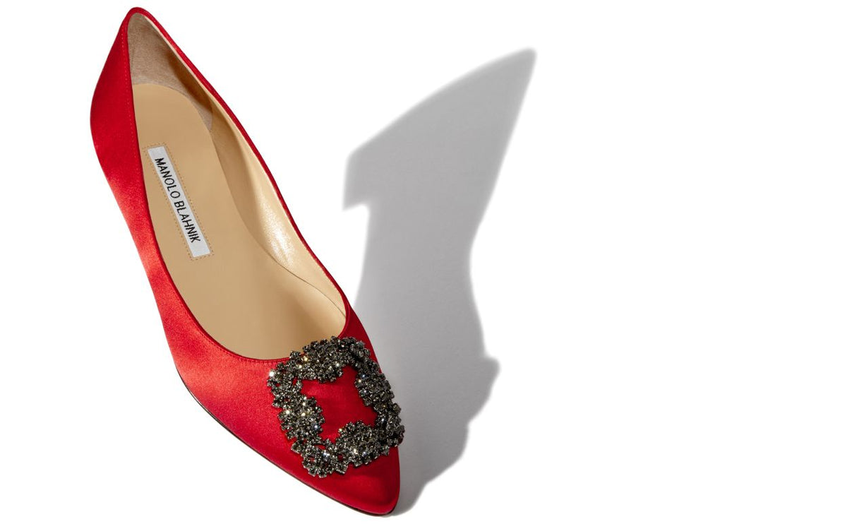 Valentina Dawn Red Jewel Buckle Pumps – front three-quarter view showing red jewel buckle, crystal buckle, almond toe…