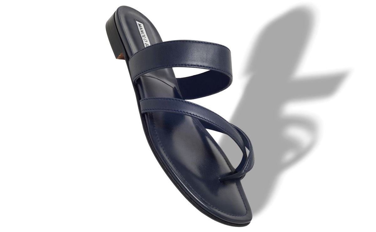 Valentina Grace Blue Crossover Mules – front three-quarter view showing blue crossover, open toe, nappa leather, Vowalisse