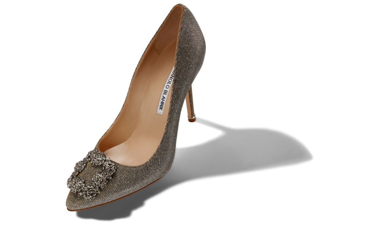 Isadora Crown Gold Jewel Buckle Pumps – front three-quarter view showing gold jewel buckle, crystal buckle, almond toe…