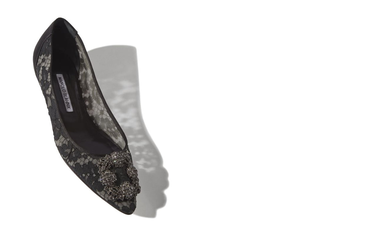 Lucienne Élan Black Jewel Buckle Pumps – front three-quarter view showing black jewel buckle, crystal buckle, almond toe…