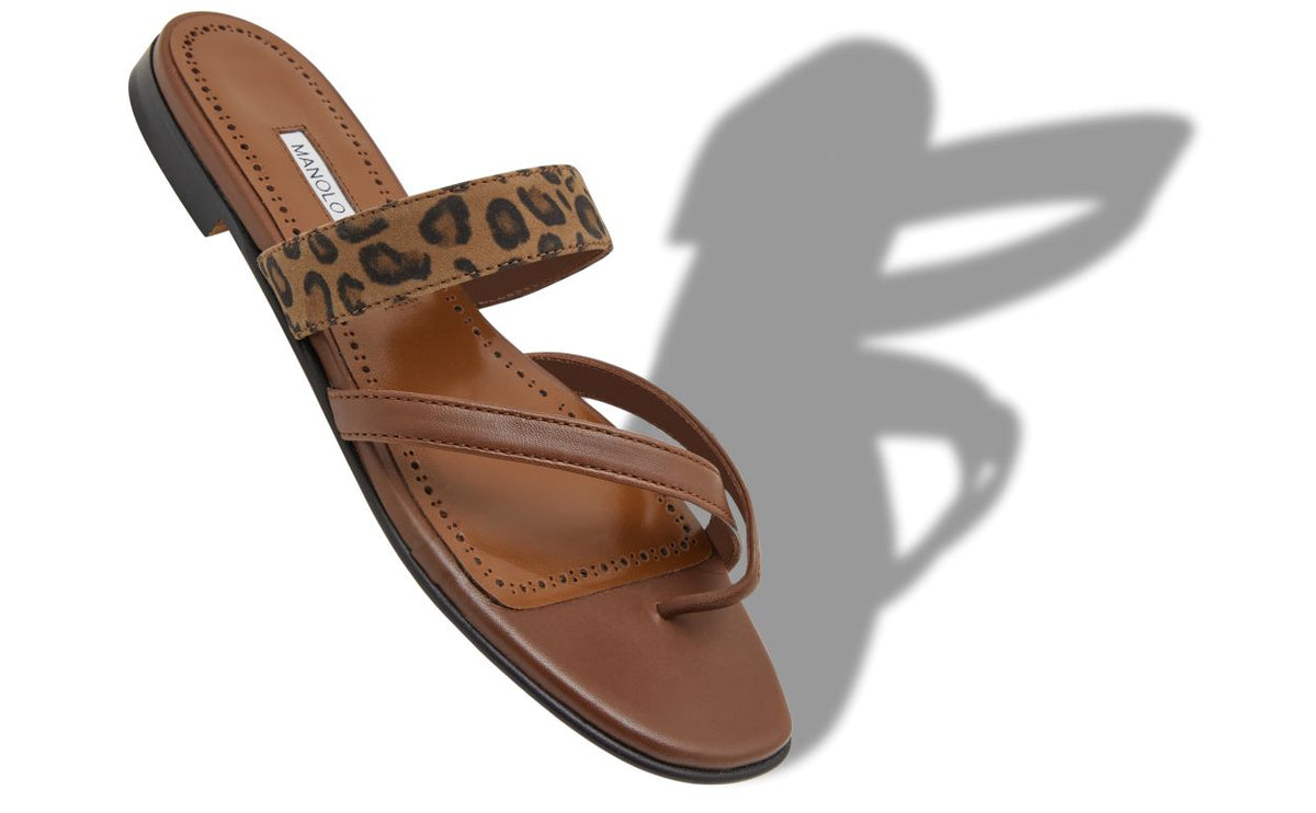 Isadora Muse Brown Crossover Mules – front three-quarter view showing brown crossover, open toe, suede, nappa leather…