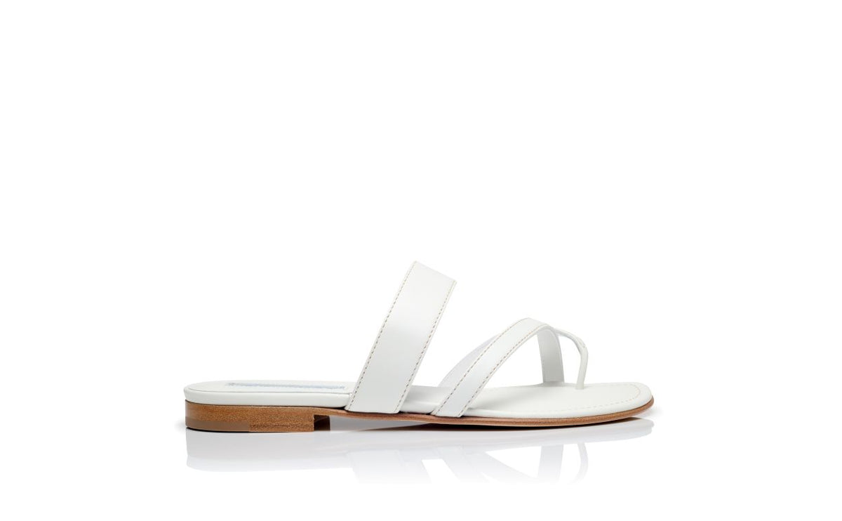 Noelle Shine White Crossover Mules – side profile showing white crossover, open toe, Vowalisse