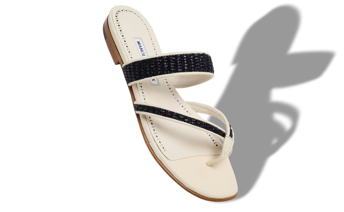 Evangeline Grace Neutral Crossover Mules – front three-quarter view showing neutral crossover, open toe, raffia, Vowalisse