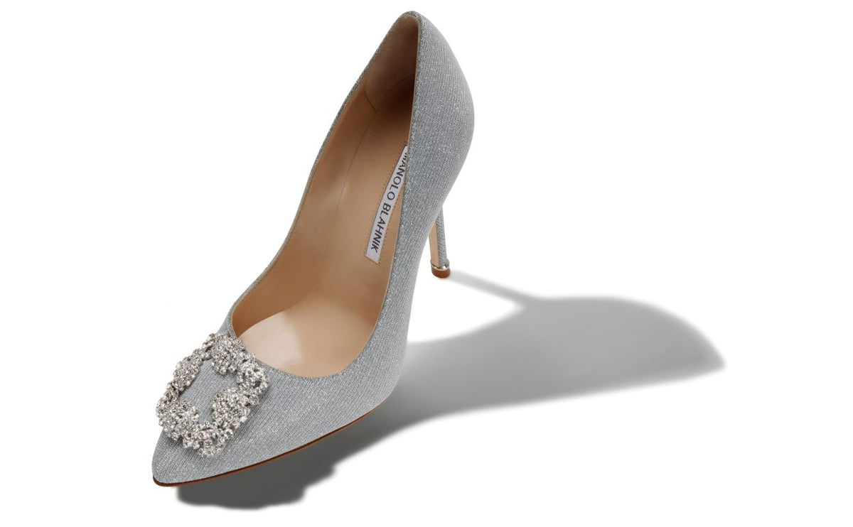 Cressida Crown Silver Jewel Buckle Pumps – front three-quarter view showing silver jewel buckle, crystal buckle, almond toe…