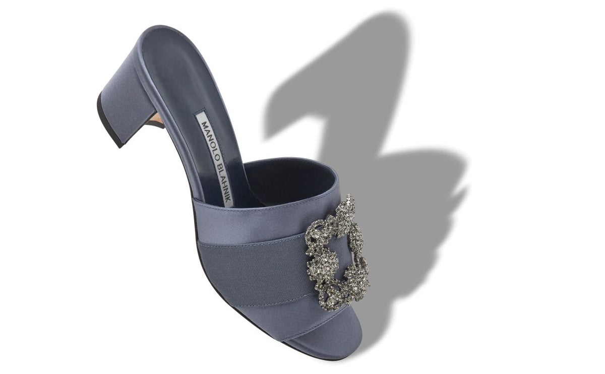Isadora Flame Blue Jewel Buckle Mules – front three-quarter view showing blue jewel buckle, crystal buckle, satin…