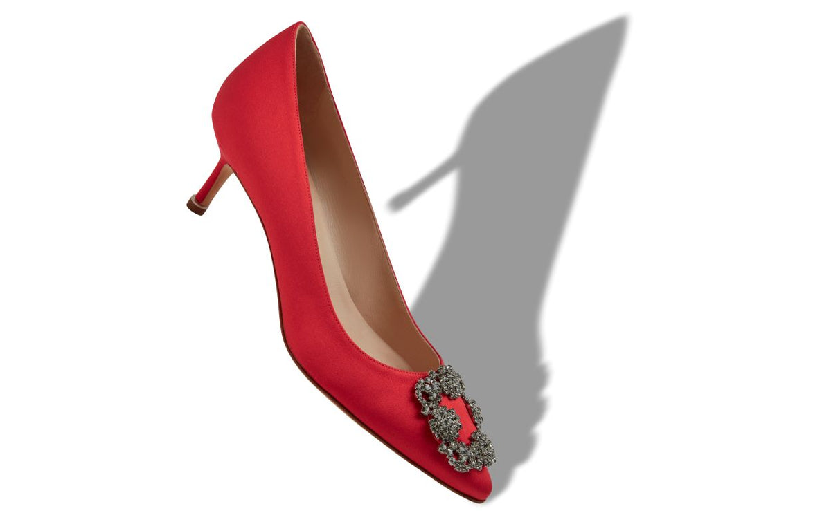 Delphine Grace Red Jewel Buckle Pumps – front three-quarter view showing red jewel buckle, crystal buckle, almond toe…