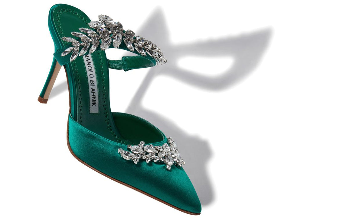 Fiorella Dawn Green Crystal Embellished Mules – front three-quarter view showing green crystal embellished, pointed toe…