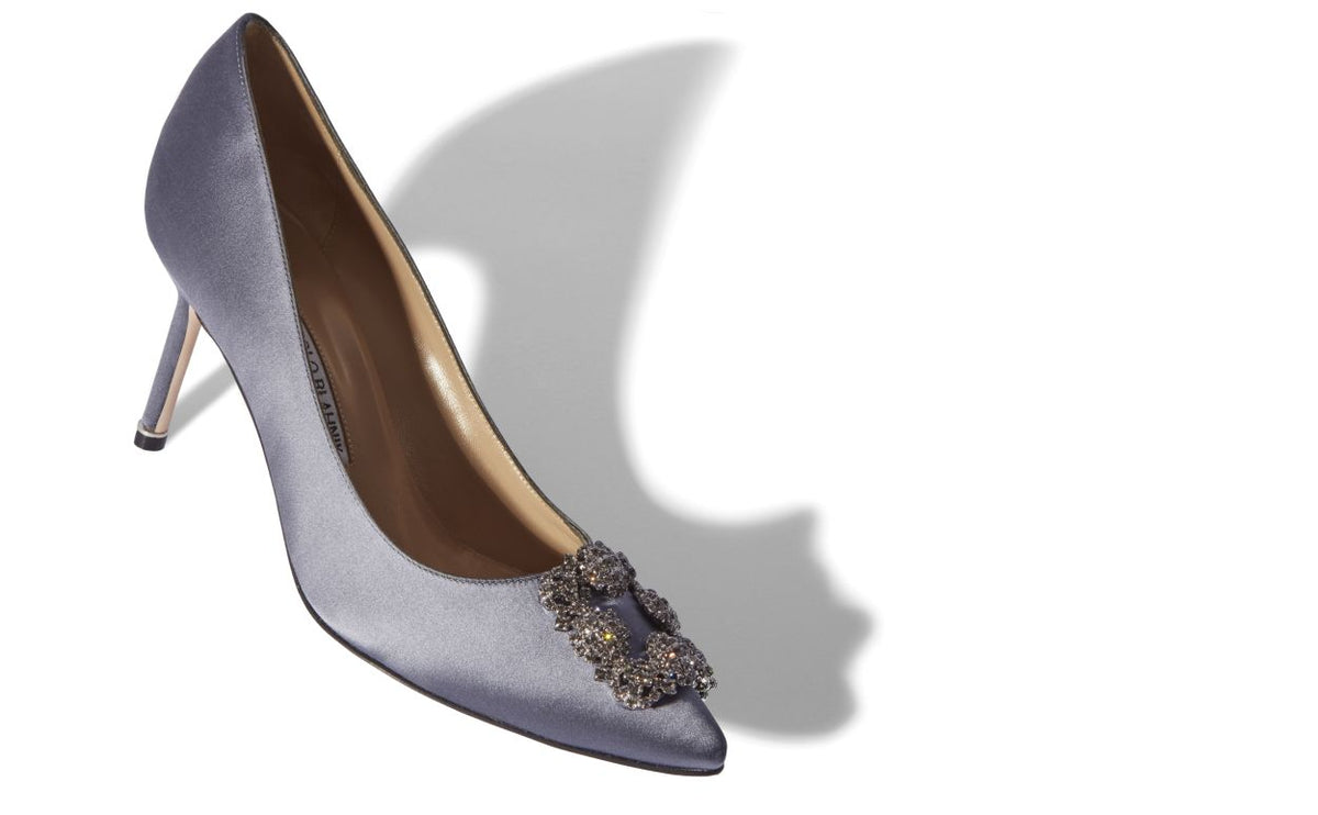 Colette Bloom Blue Jewel Buckle Pumps – front three-quarter view showing blue jewel buckle, crystal buckle, almond toe…