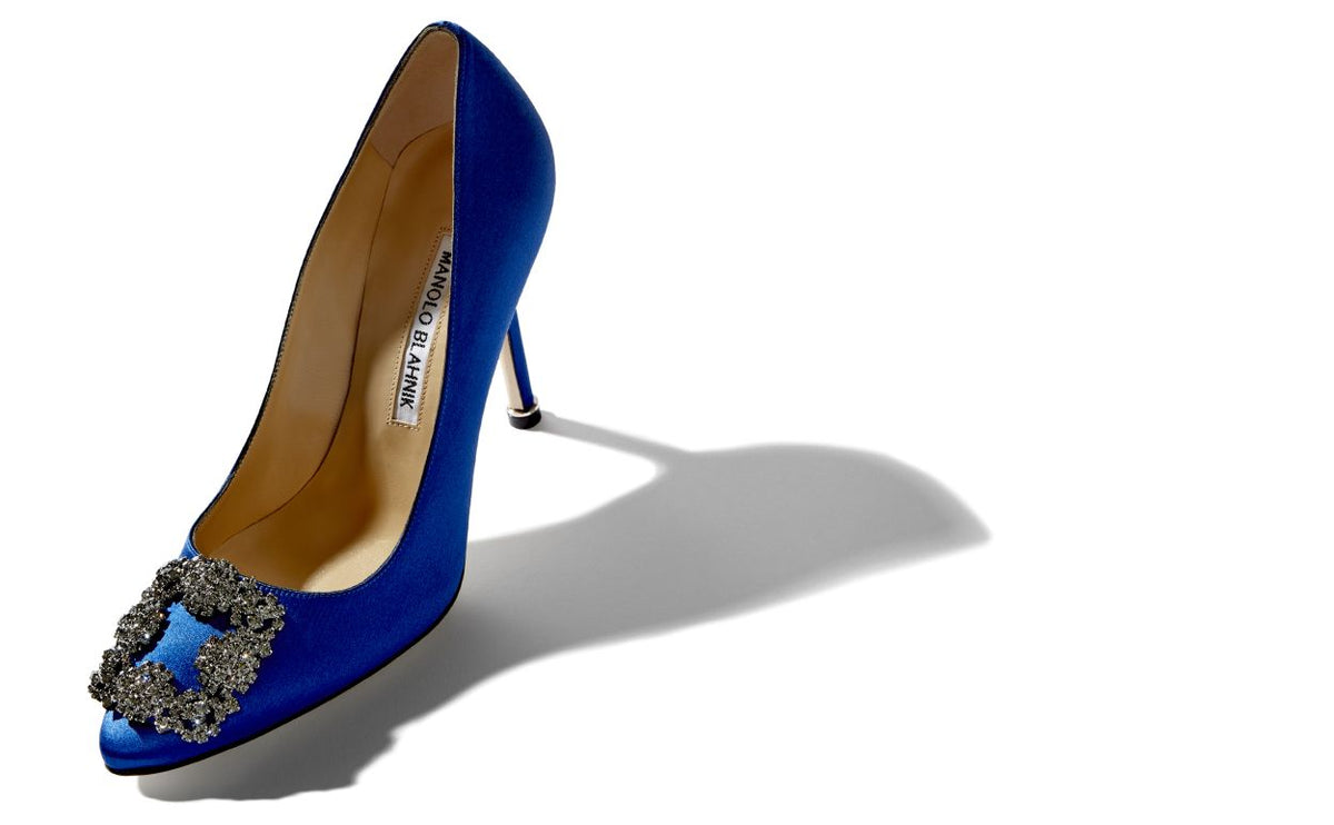 Aurelia Belle Blue Jewel Buckle Pumps – front three-quarter view showing blue jewel buckle, crystal buckle, almond toe…