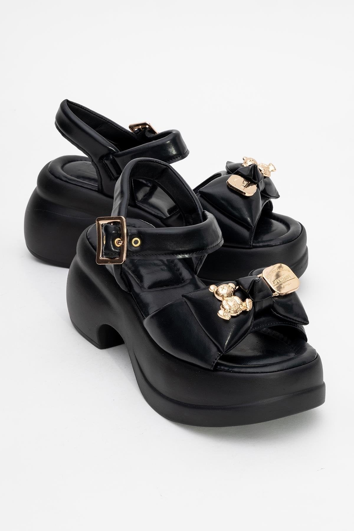 Merida Black Buckle Platform Sandal – front three-quarter view showing leather, black, gold, Vowalisse