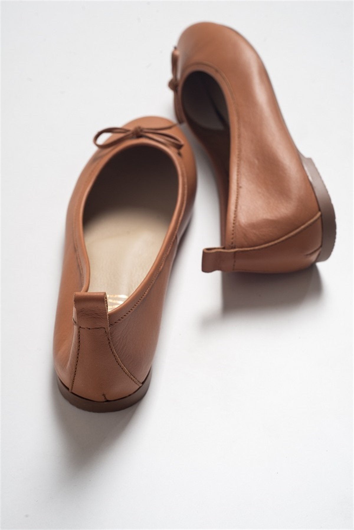Florence - Cognac Brown Leather Ballerina Flats – detail view showing bow, leather, suede, Vowalisse