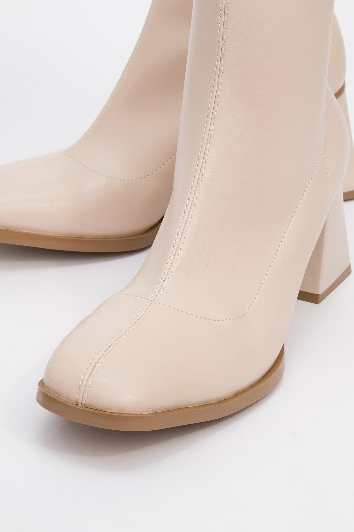 Plesa Beige Chunky Heel Boot – detail view showing leather, red, Vowalisse