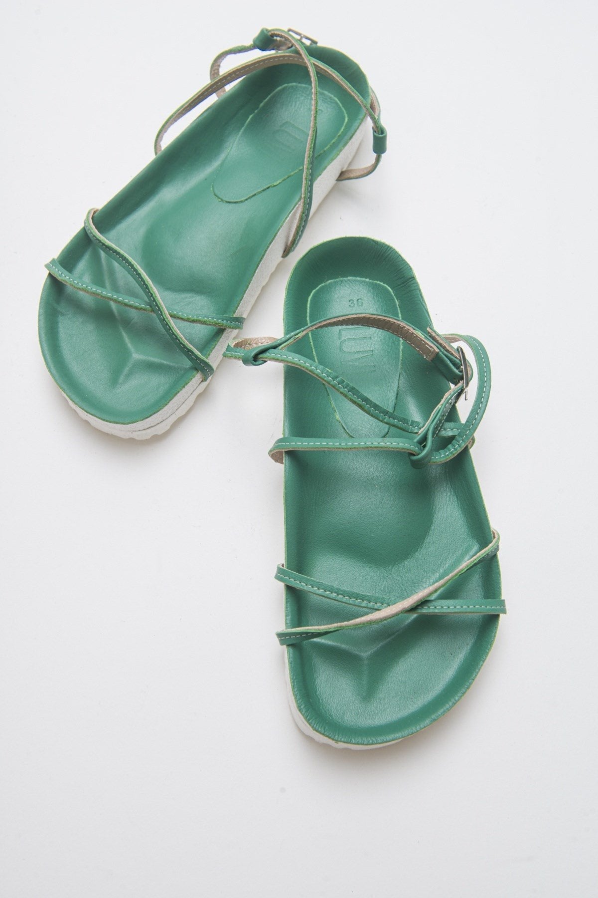 Muse - Green Genuine Leather Sandal – front three-quarter view showing leather, green, Vowalisse
