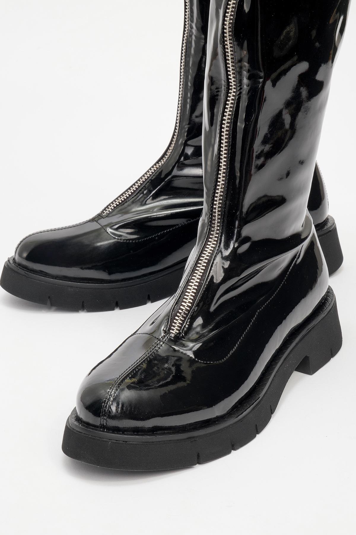 Reus - Black Patent Front-Zip Boot – detail view showing leather, black, Vowalisse