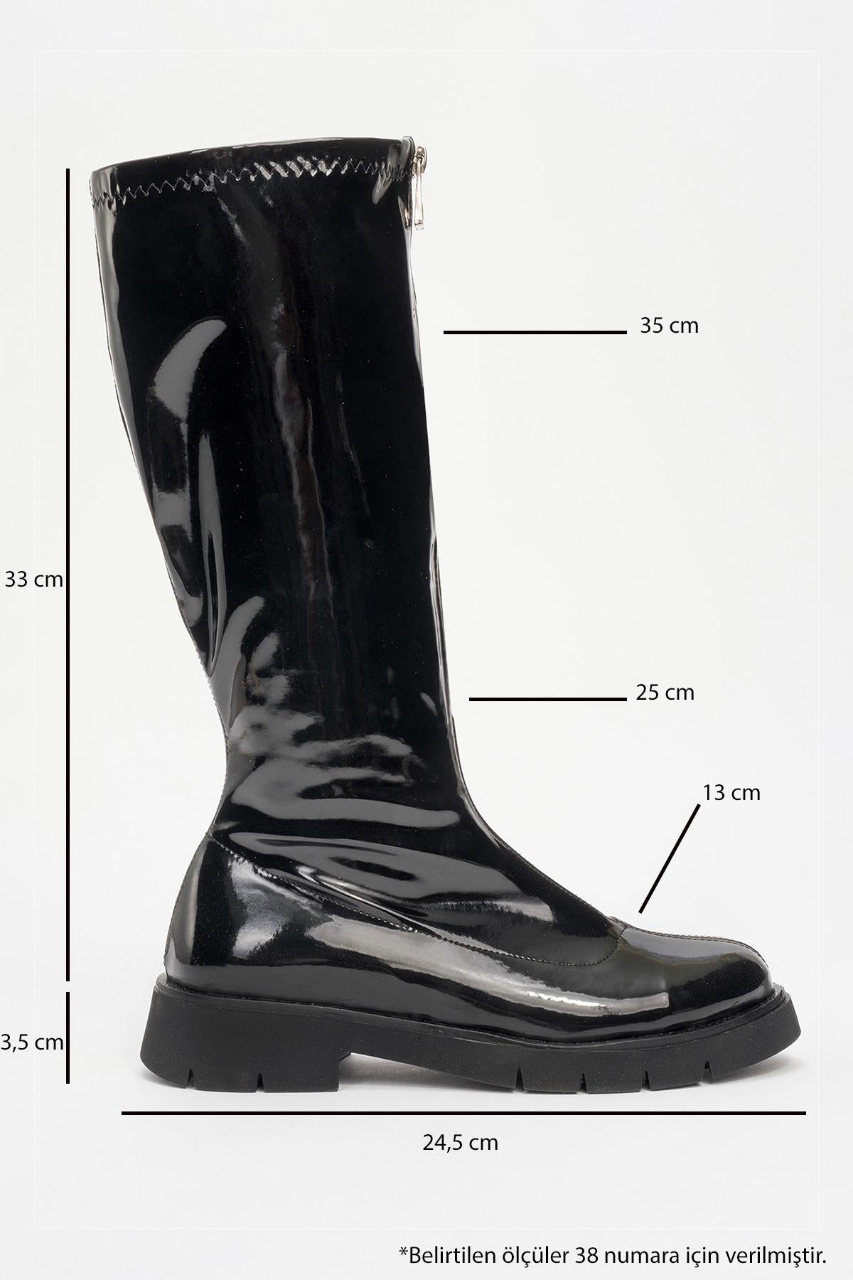 Reus - Black Patent Front-Zip Boot – heel view showing leather, black, Vowalisse