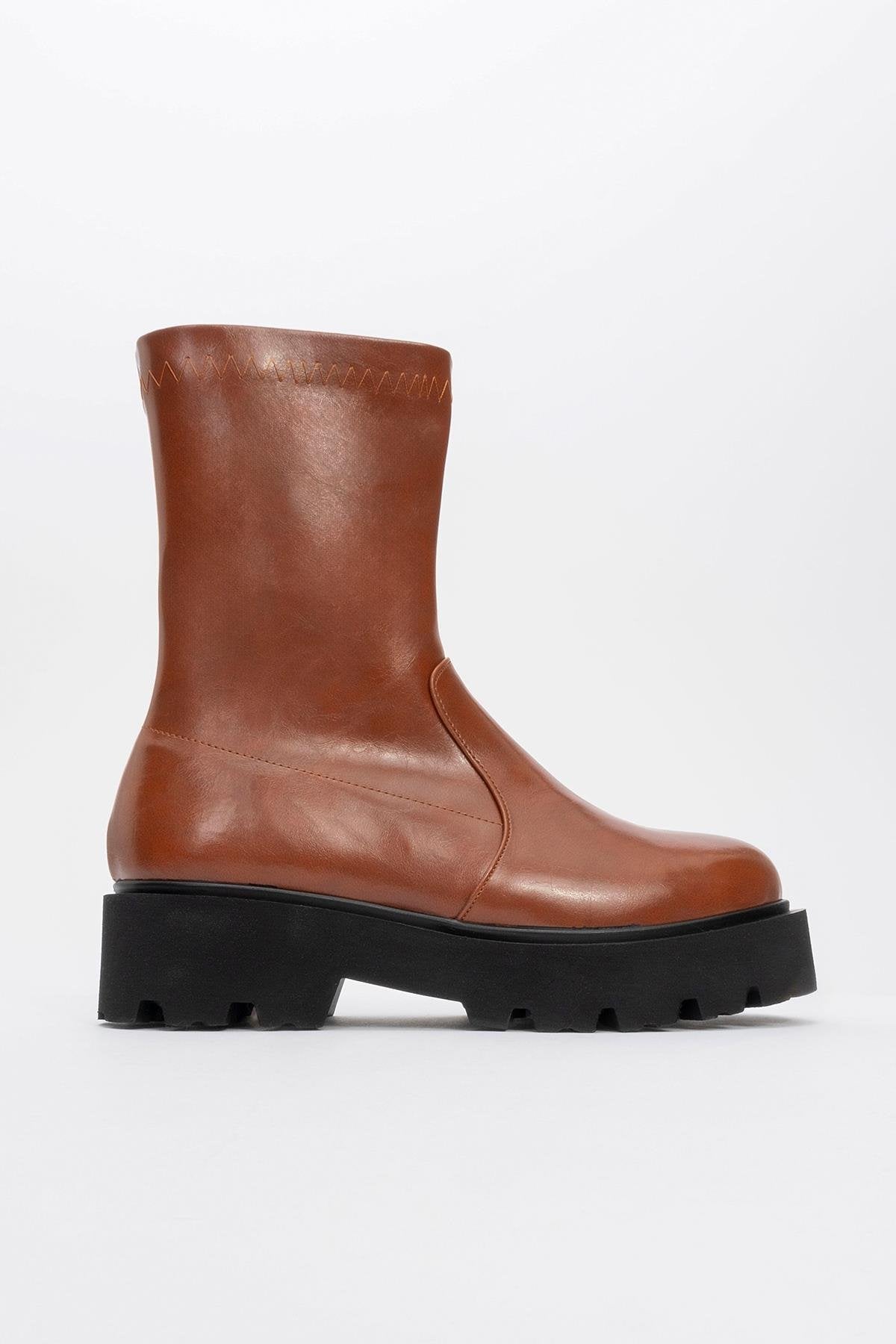 Rush Cognac Bootie – heel view showing leather, Vowalisse