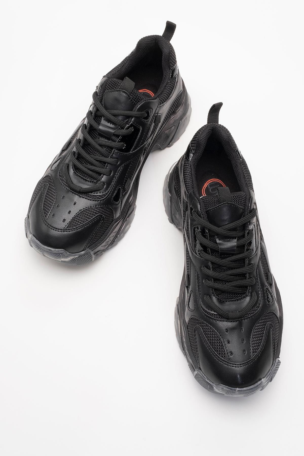 Loretta - Black Sneaker – side view showing leather, black, Vowalisse