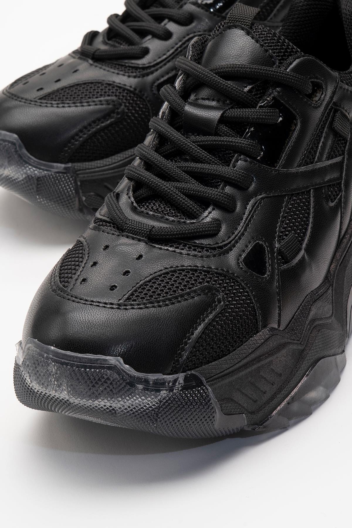 Loretta - Black Sneaker – detail view showing leather, black, Vowalisse