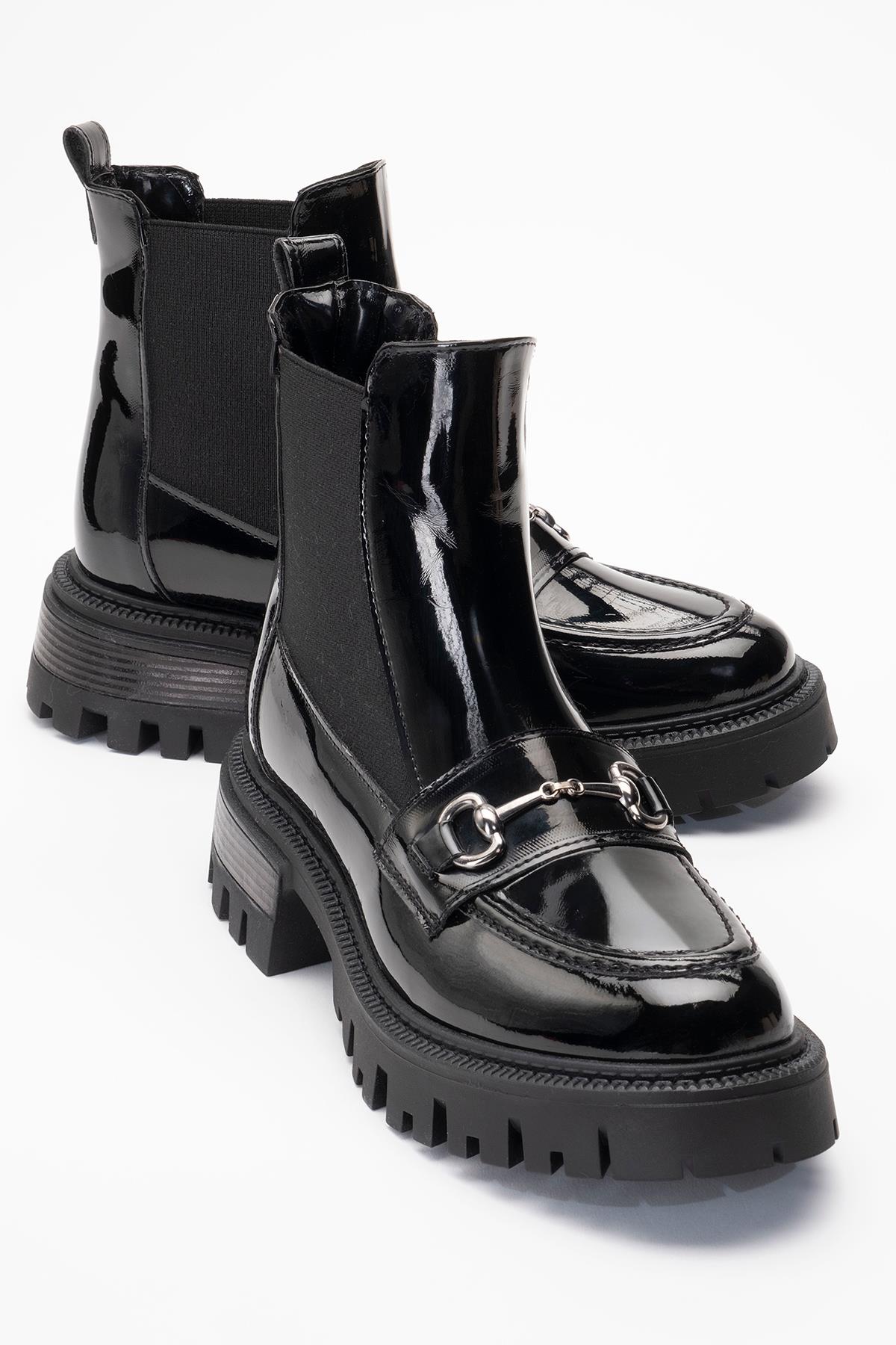 Vesper Black Patent Buckled Chelsea Boot – front three-quarter view showing leather, black, Vowalisse
