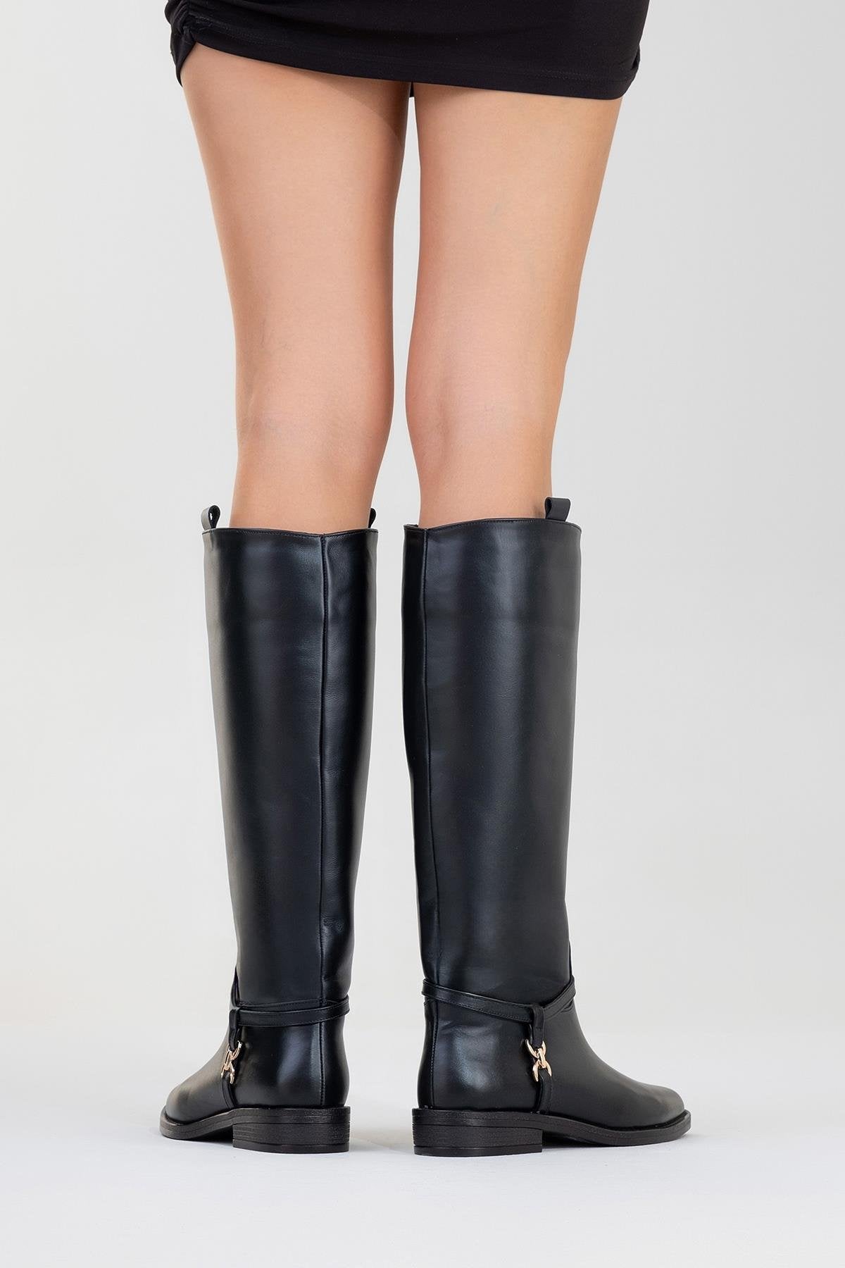 May Black Leather Buckle Boot – sole view showing leather, black, gold, Vowalisse
