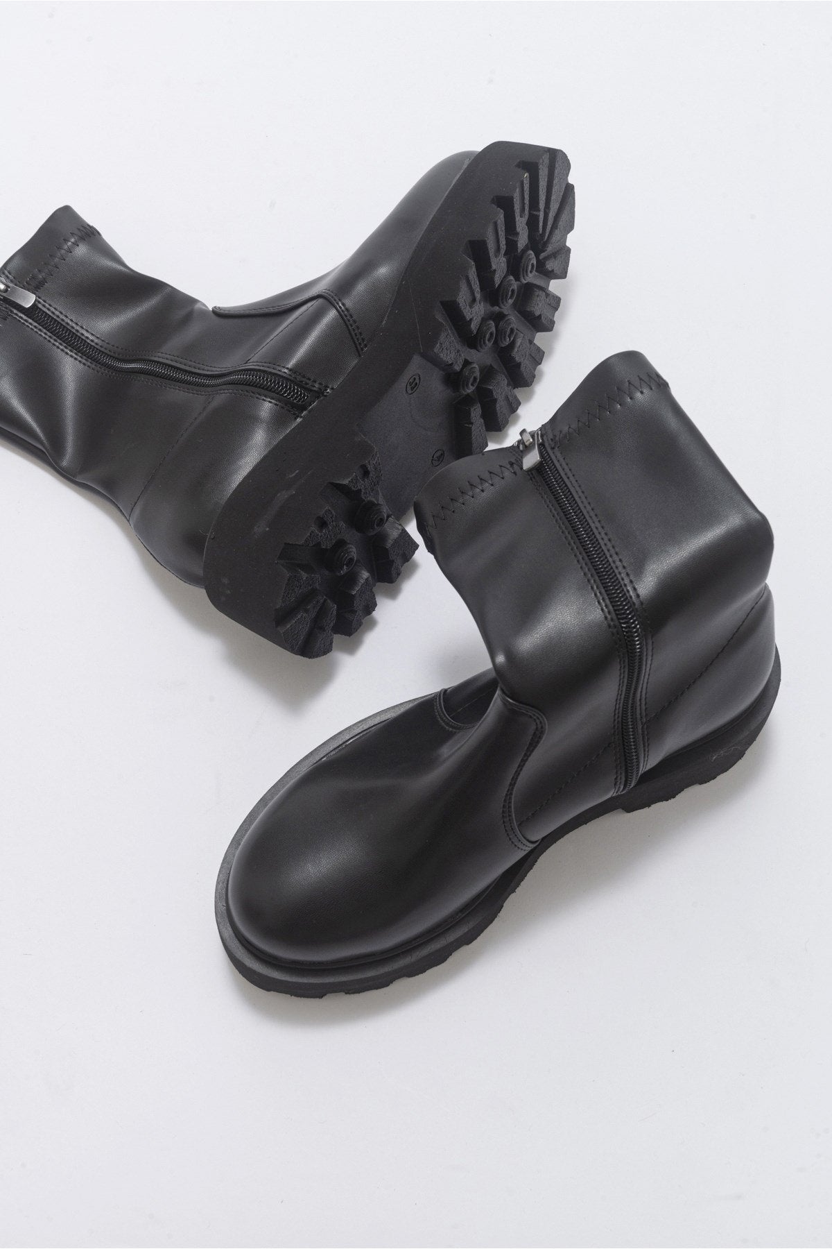 Rush Black Bootie – heel view showing leather, black, Vowalisse