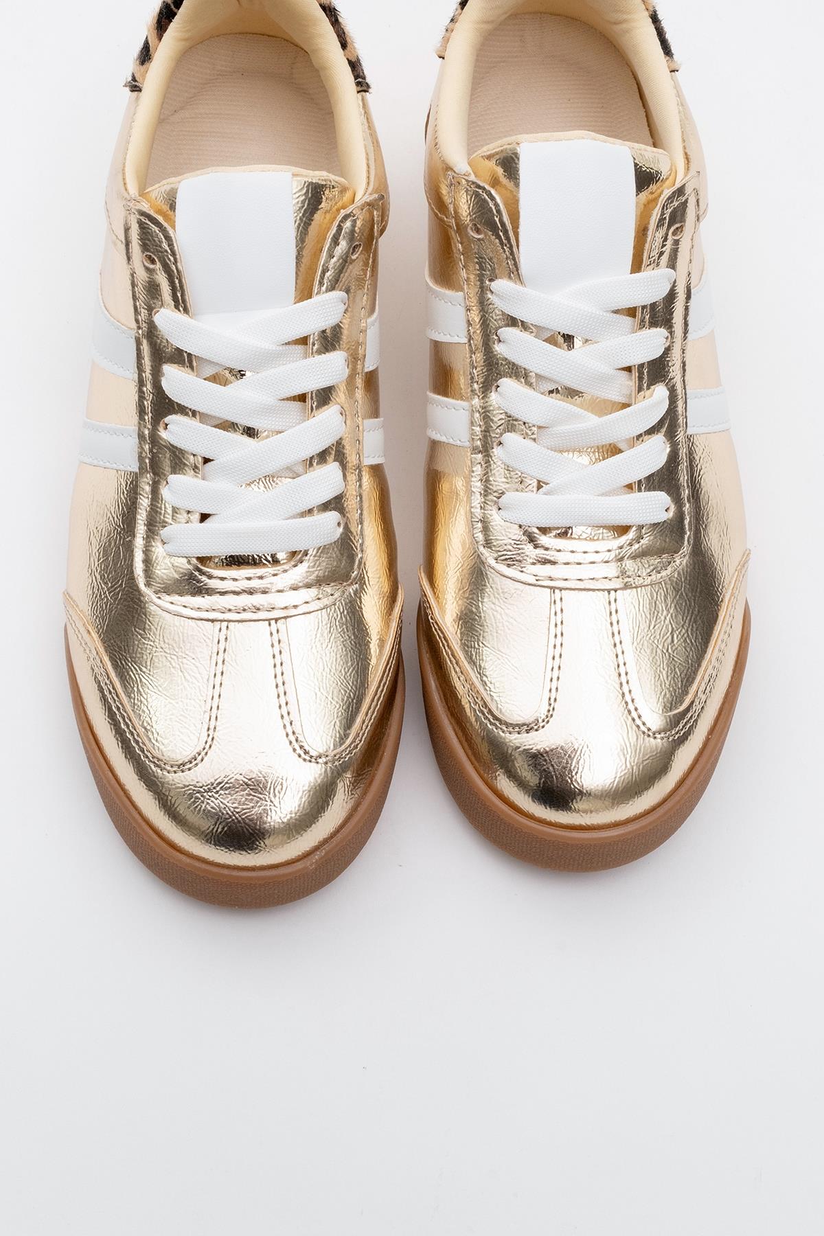 Jimmy - Gold Sneaker – side view showing leather, gold, Vowalisse