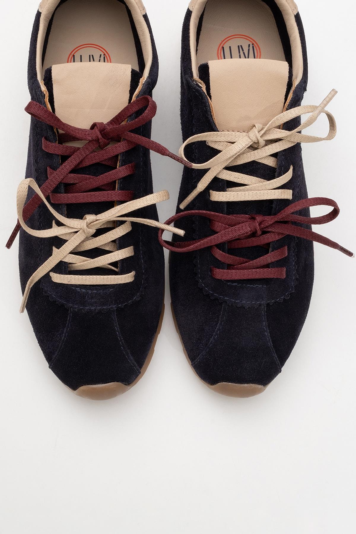 Crea - Navy Leather Sneakers – detail view showing leather, red, Vowalisse
