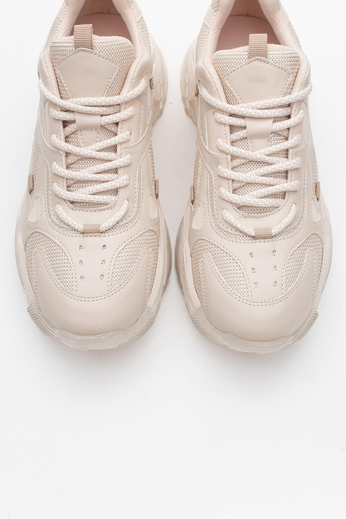 Loretta - Beige Sneaker – side view showing leather, Vowalisse