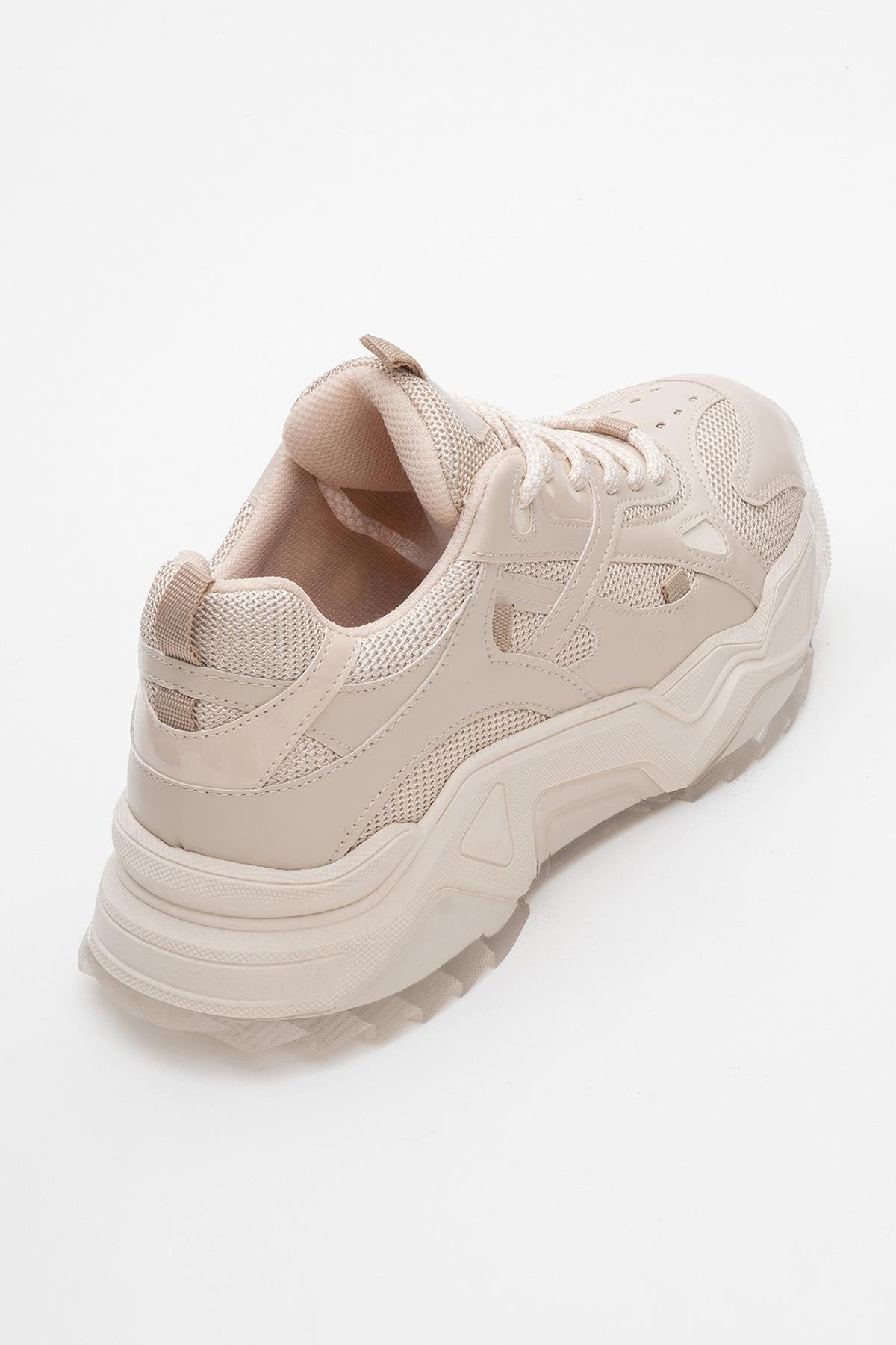 Loretta - Beige Sneaker – back view showing leather, Vowalisse