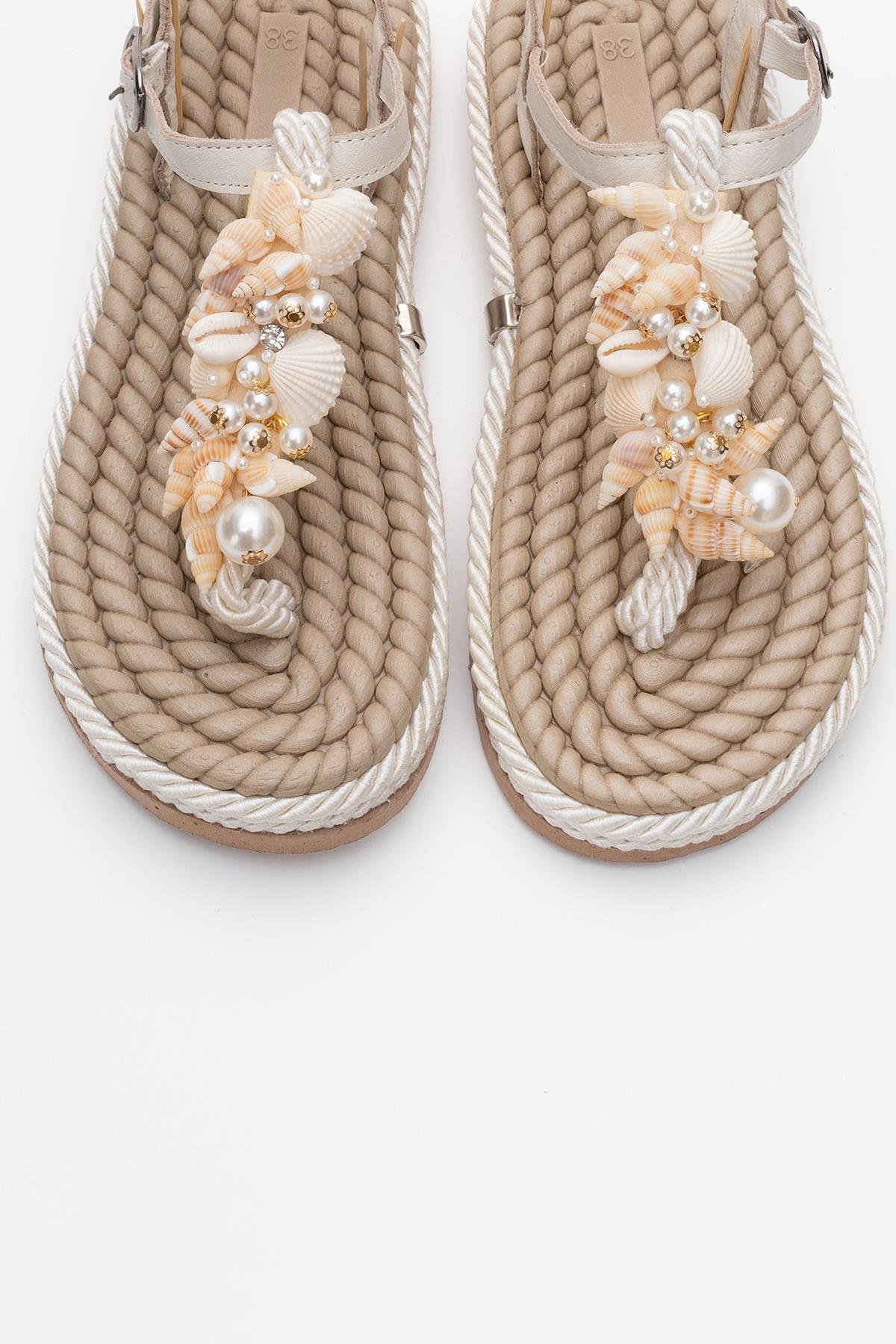 Lely Beige Leather Thong Sandal – side view showing lace, leather, red, Vowalisse