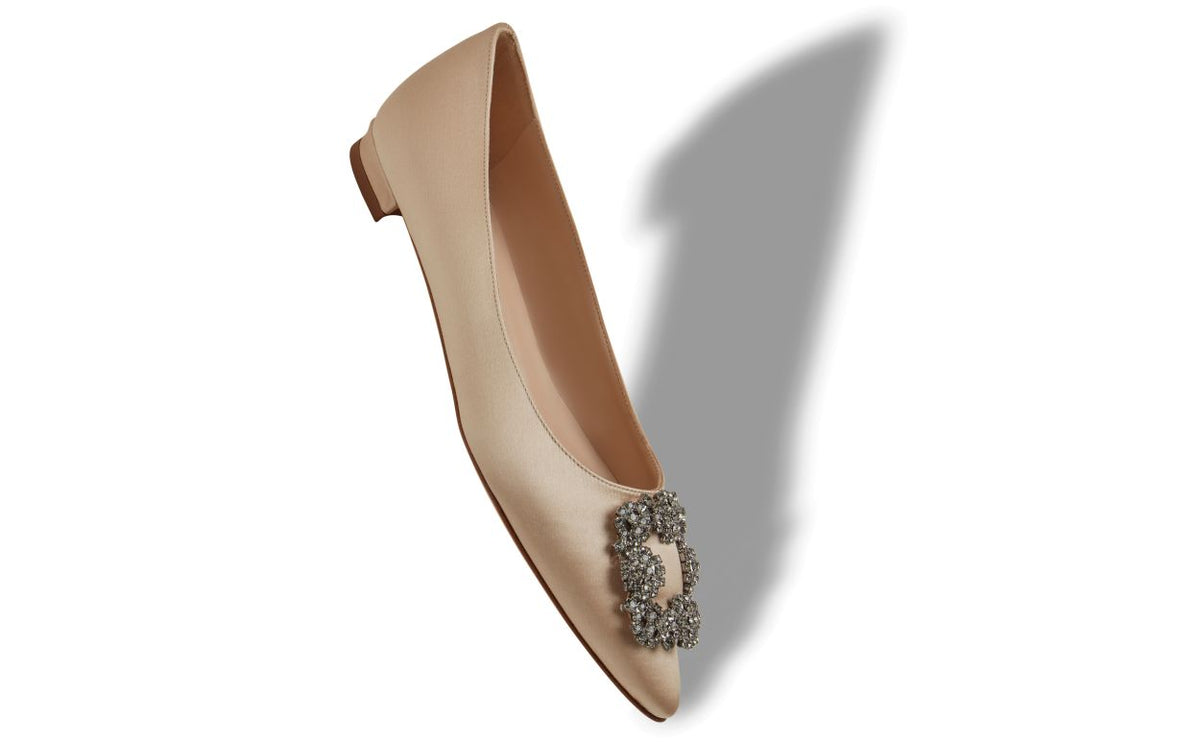 Genevieve Bloom Neutral Jewel Buckle Pumps – front three-quarter view showing neutral jewel buckle, crystal buckle, almond…