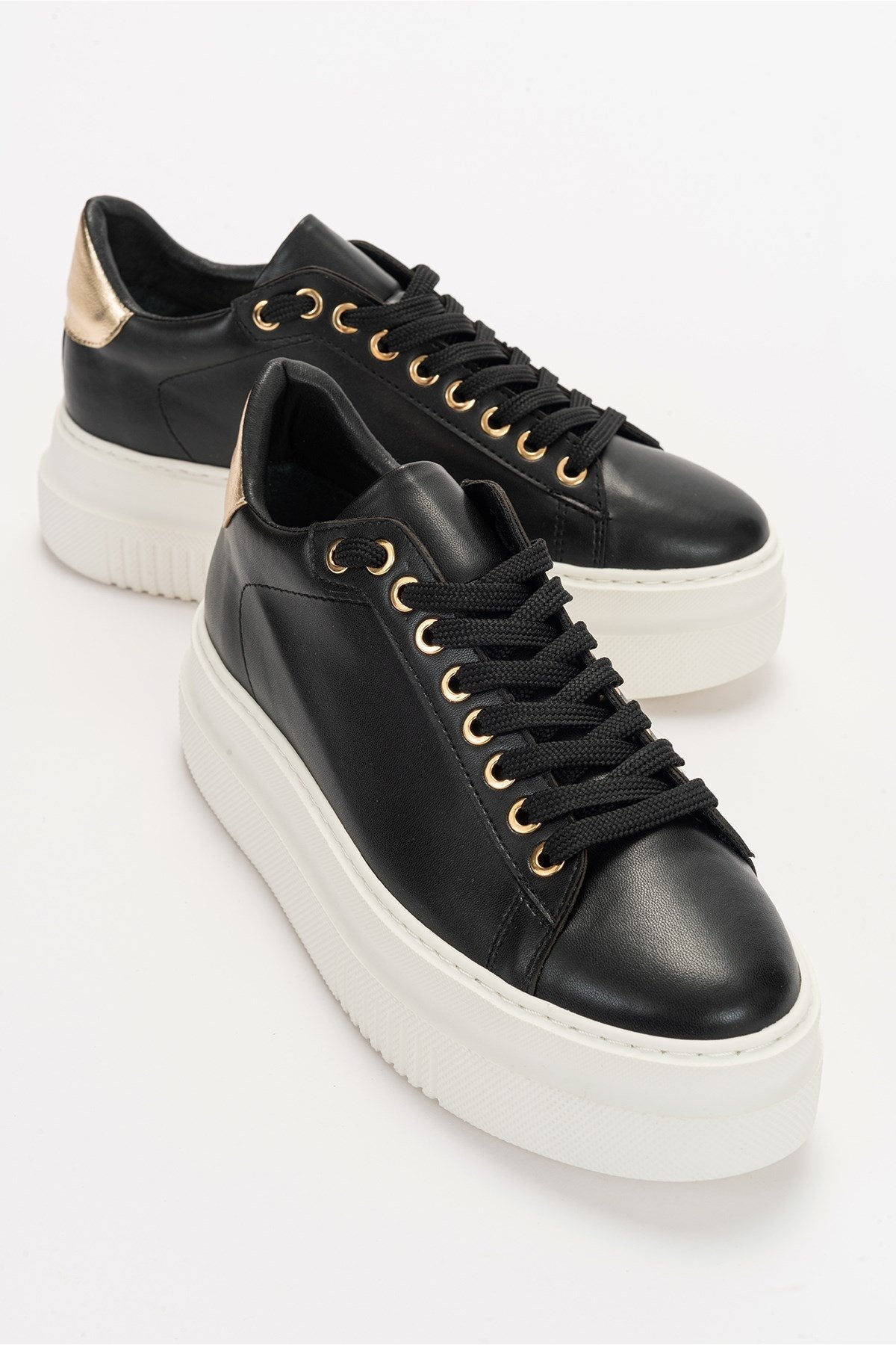 Violette - Black Sneaker – front three-quarter view showing leather, black, Vowalisse