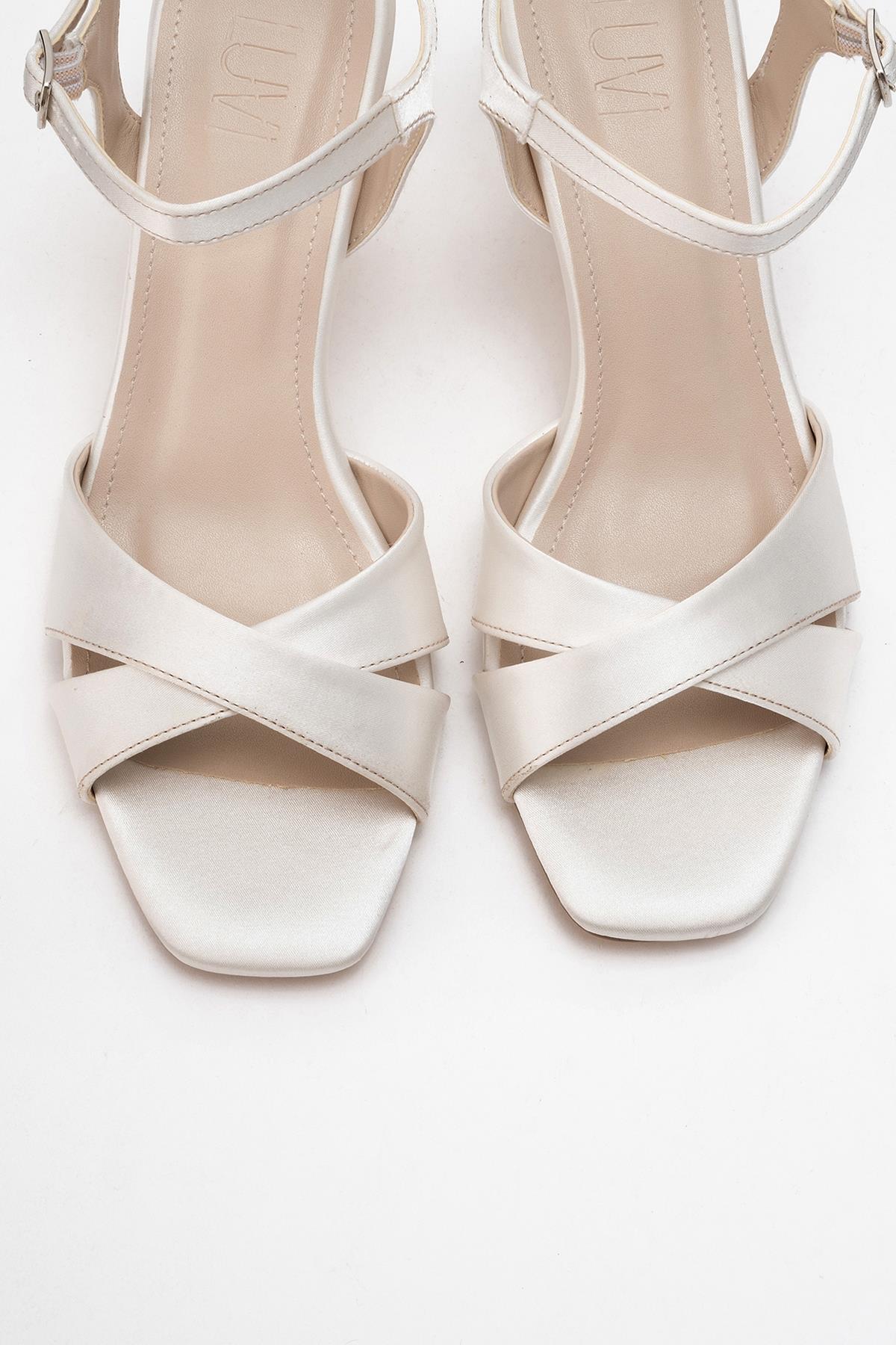 Melin - Pearl Satin Cross-Strap Stiletto Pump – side view showing pearl, satin, leather, Vowalisse