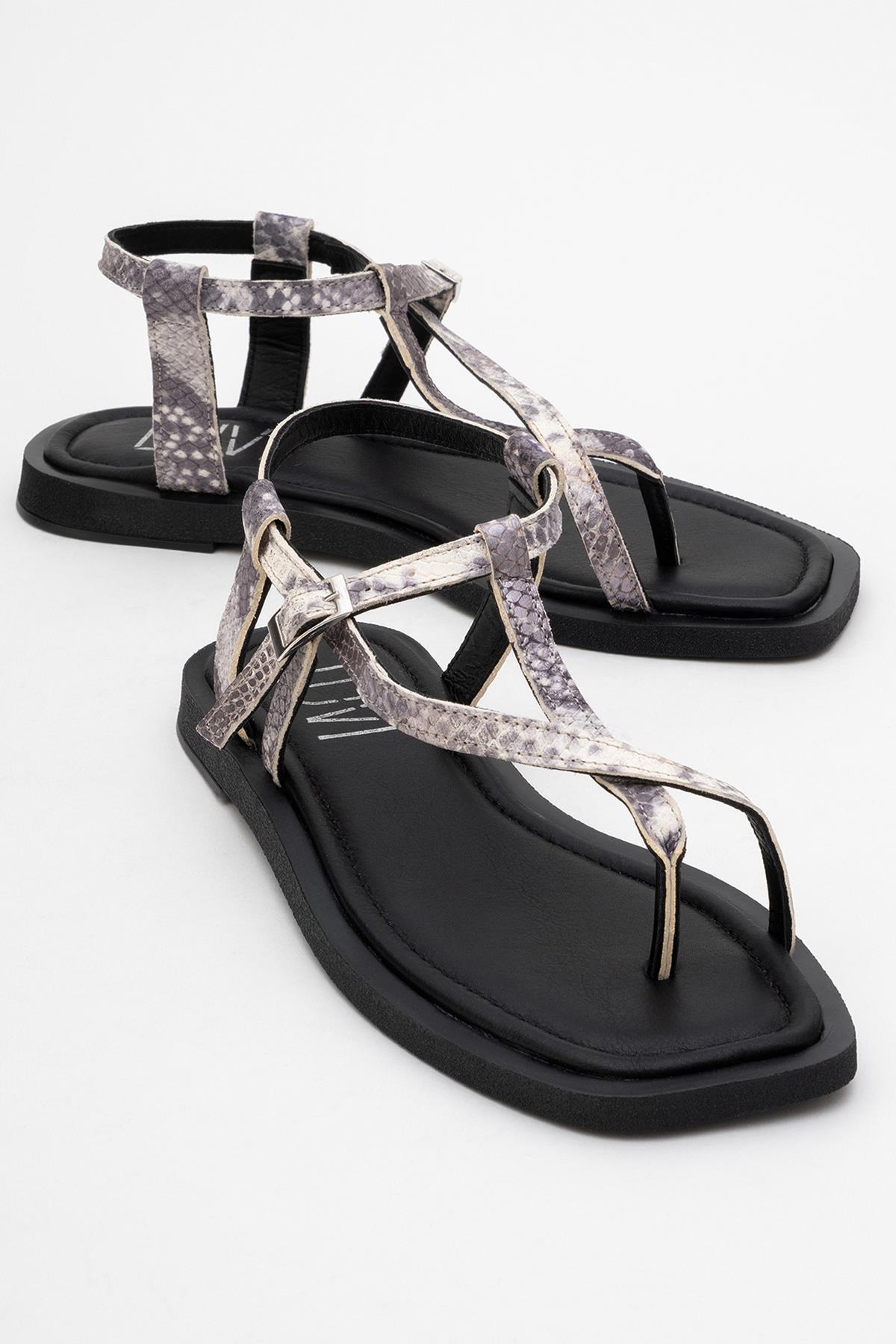 Morgana Black Leather Thong Sandal – front three-quarter view showing leather, black, Vowalisse