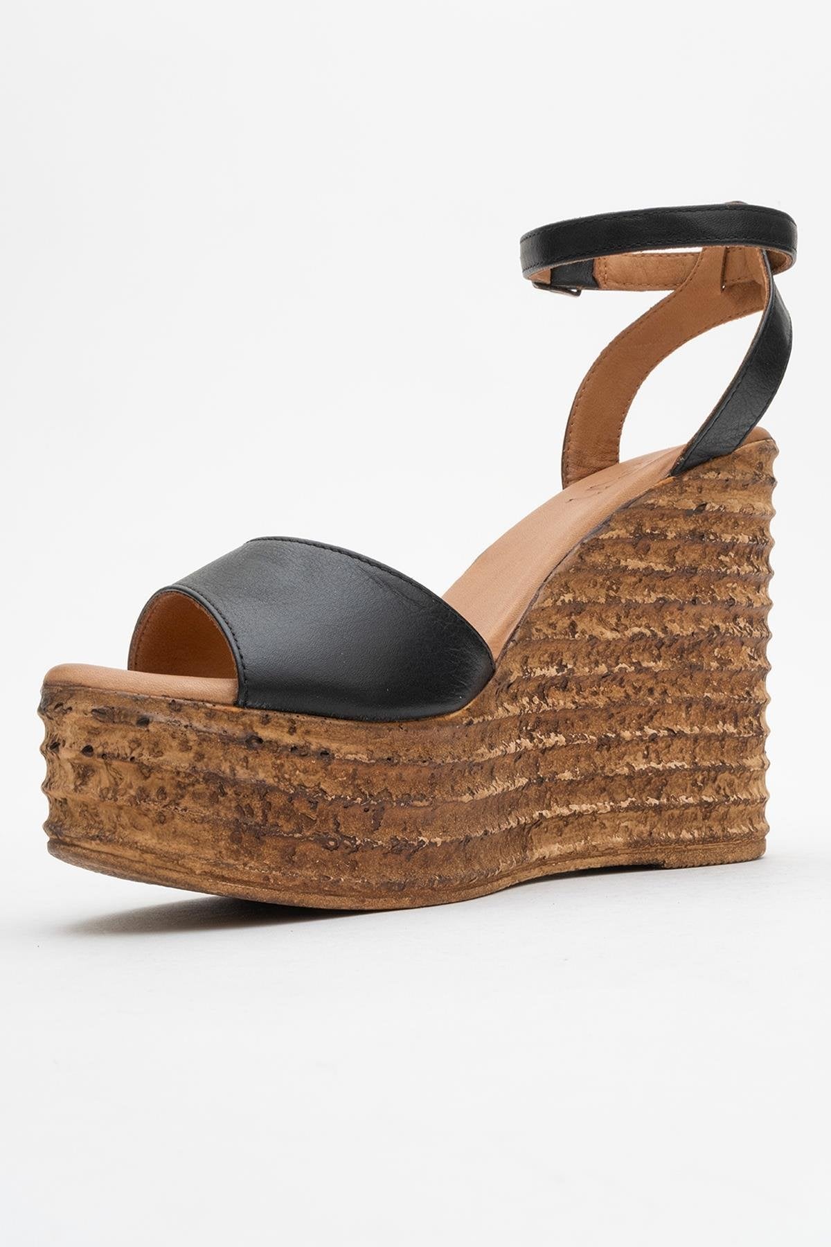 Elsie - Black Wedge Leather Sandal – heel view showing leather, black, Vowalisse