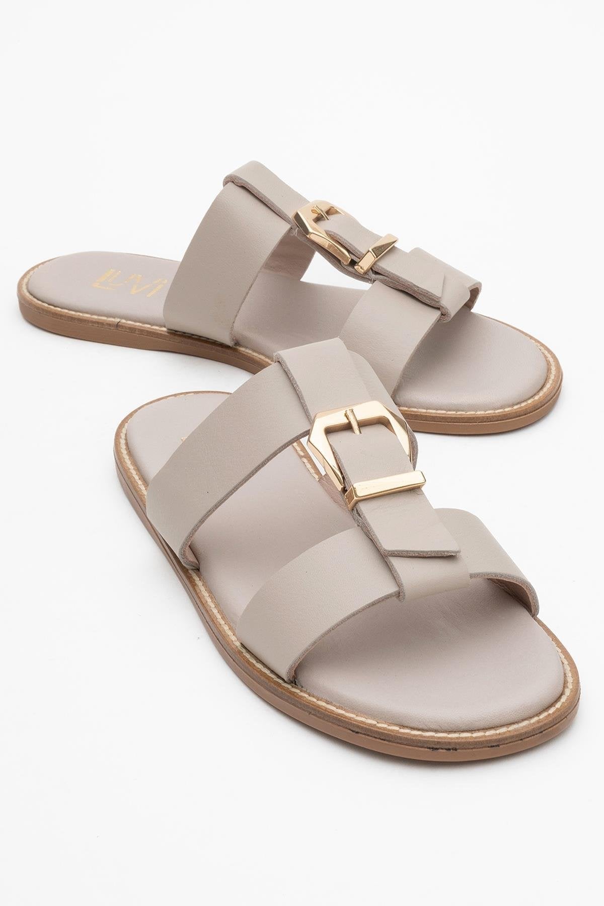 Sveta - Light Beige Leather Buckled Sandal – front three-quarter view showing leather, Vowalisse
