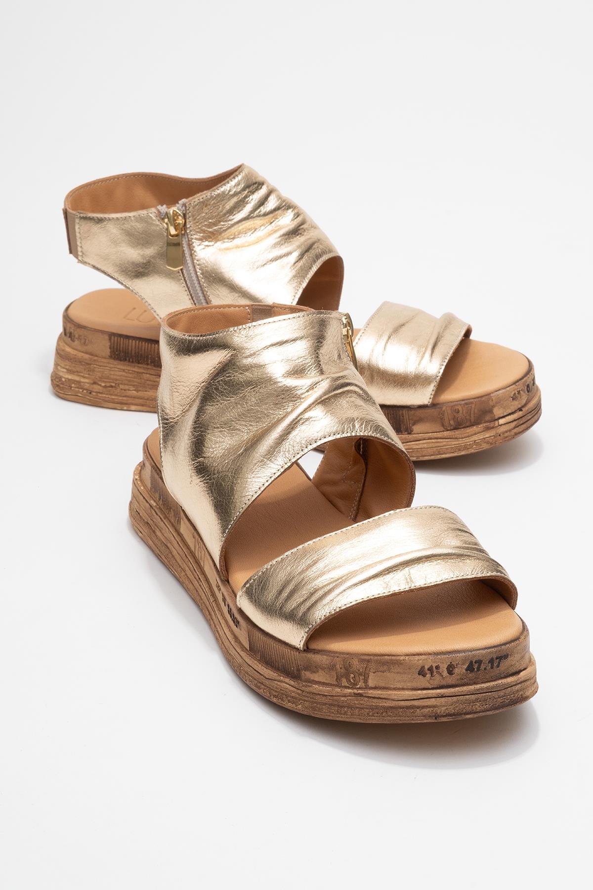 Lunas Gold Leather Side‑Zip Flat Heel Sandal – front three-quarter view showing leather, gold, red, Vowalisse
