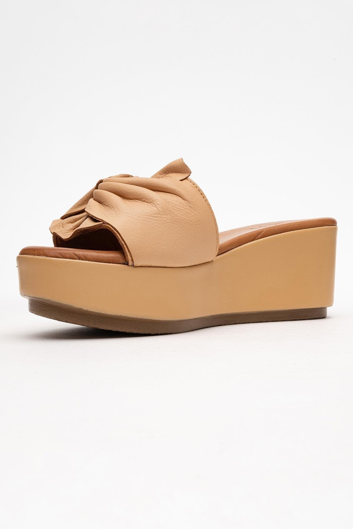 Syndra - Dark Beige Bow Wedge Leather Sandal – heel view showing bow, leather, Vowalisse