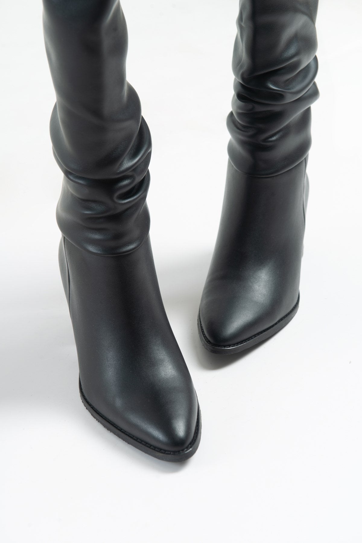 120 - Black Gusseted Block Heel Boot – back view showing leather, black, Vowalisse