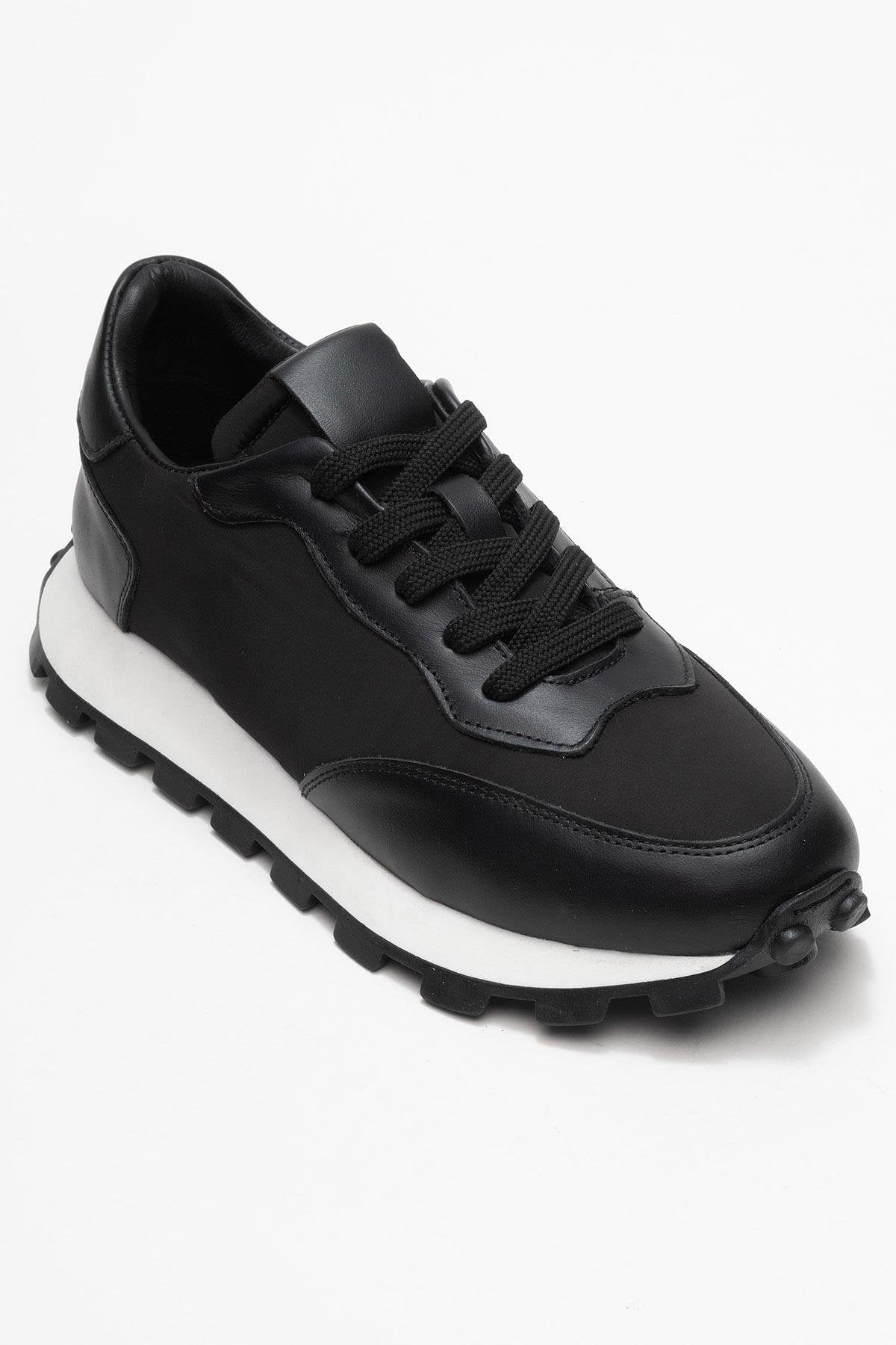 Amanda - Black Genuine Leather Sneaker – detail view showing leather, black, Vowalisse
